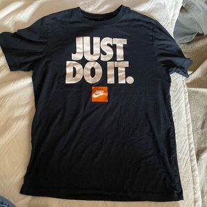 NIKE T-shirt. size medium. color is dark navy blue